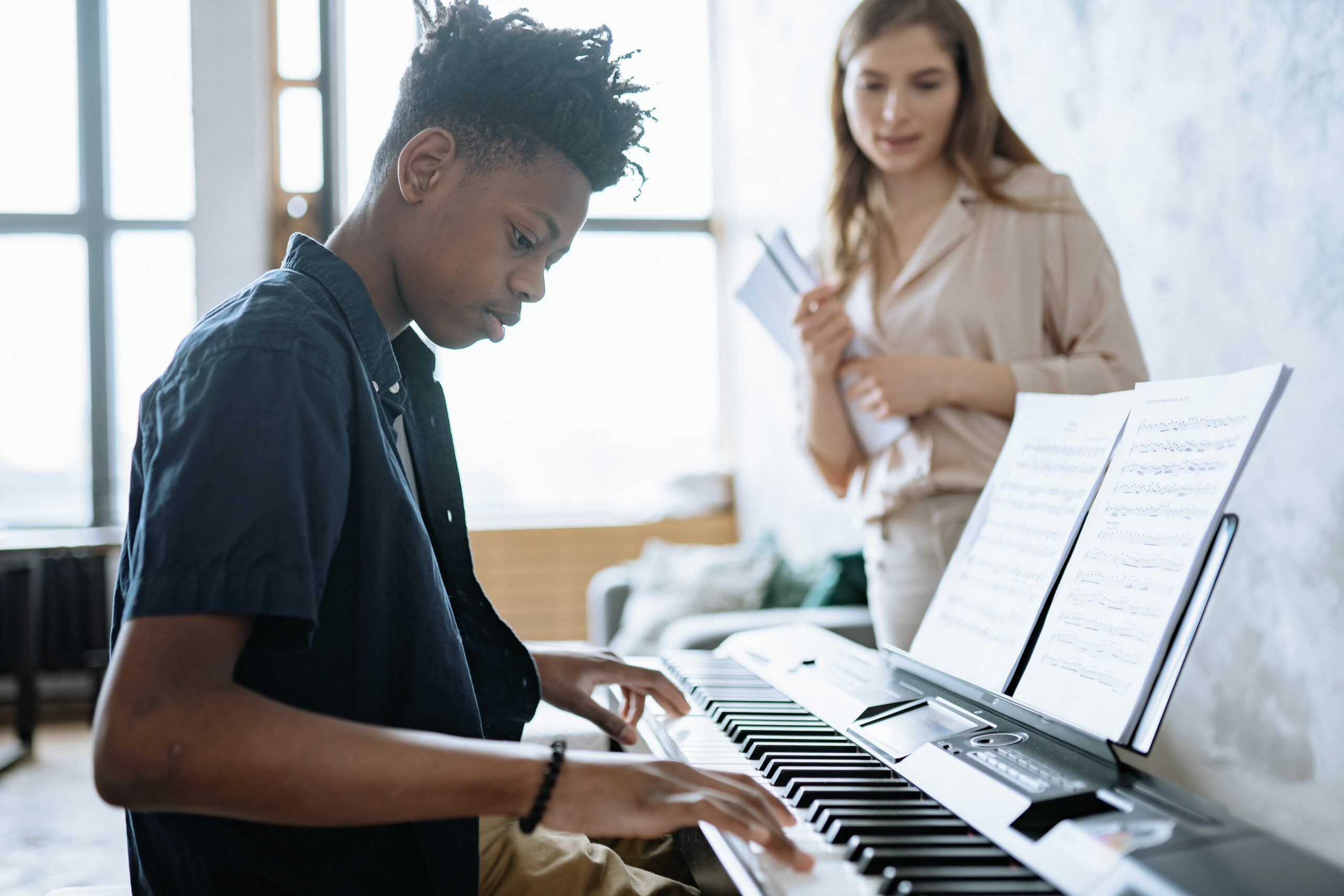 Student playing piano